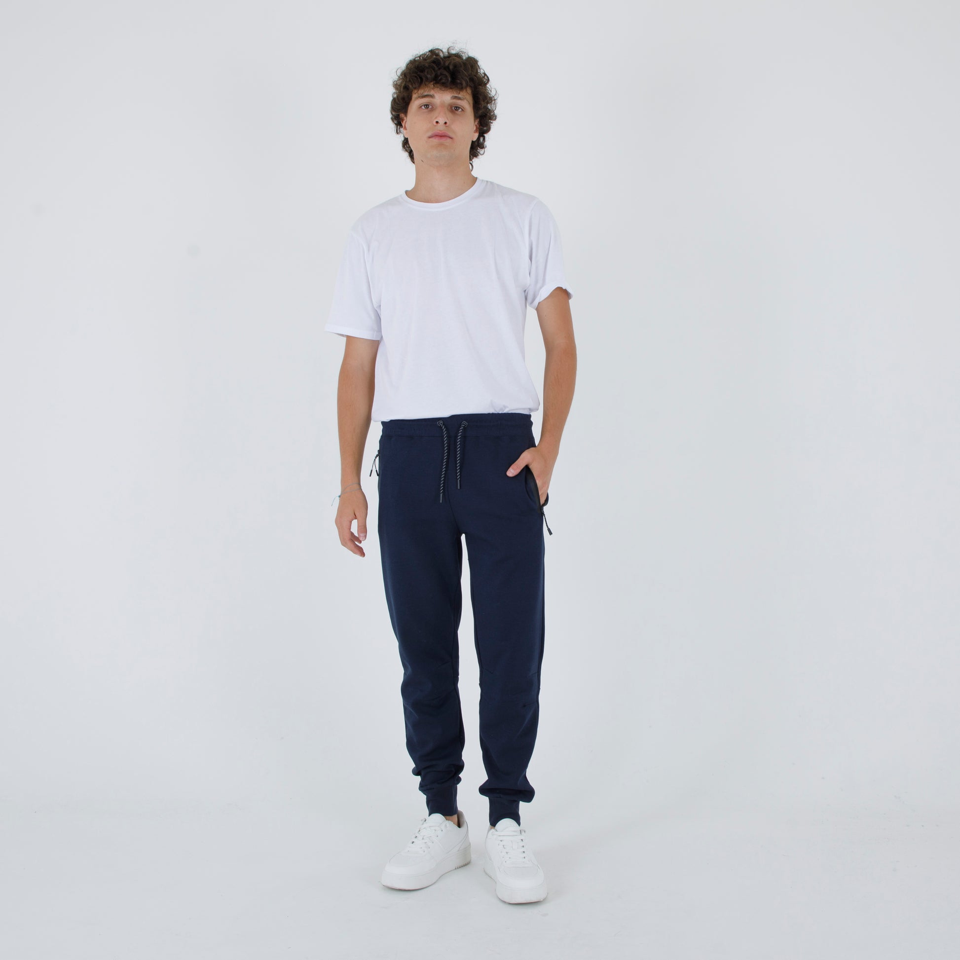 pantalone Jogger tecnico tasche termosaldate zip