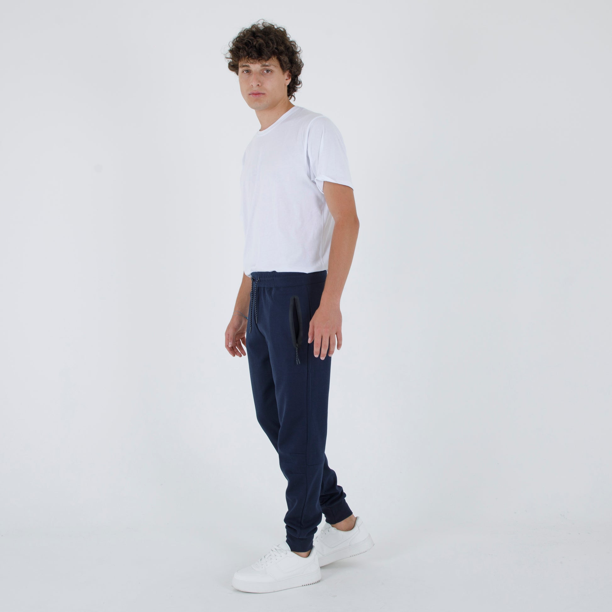 pantalone Jogger tecnico tasche termosaldate zip